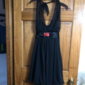 Black halter top dress with red glitter detail
